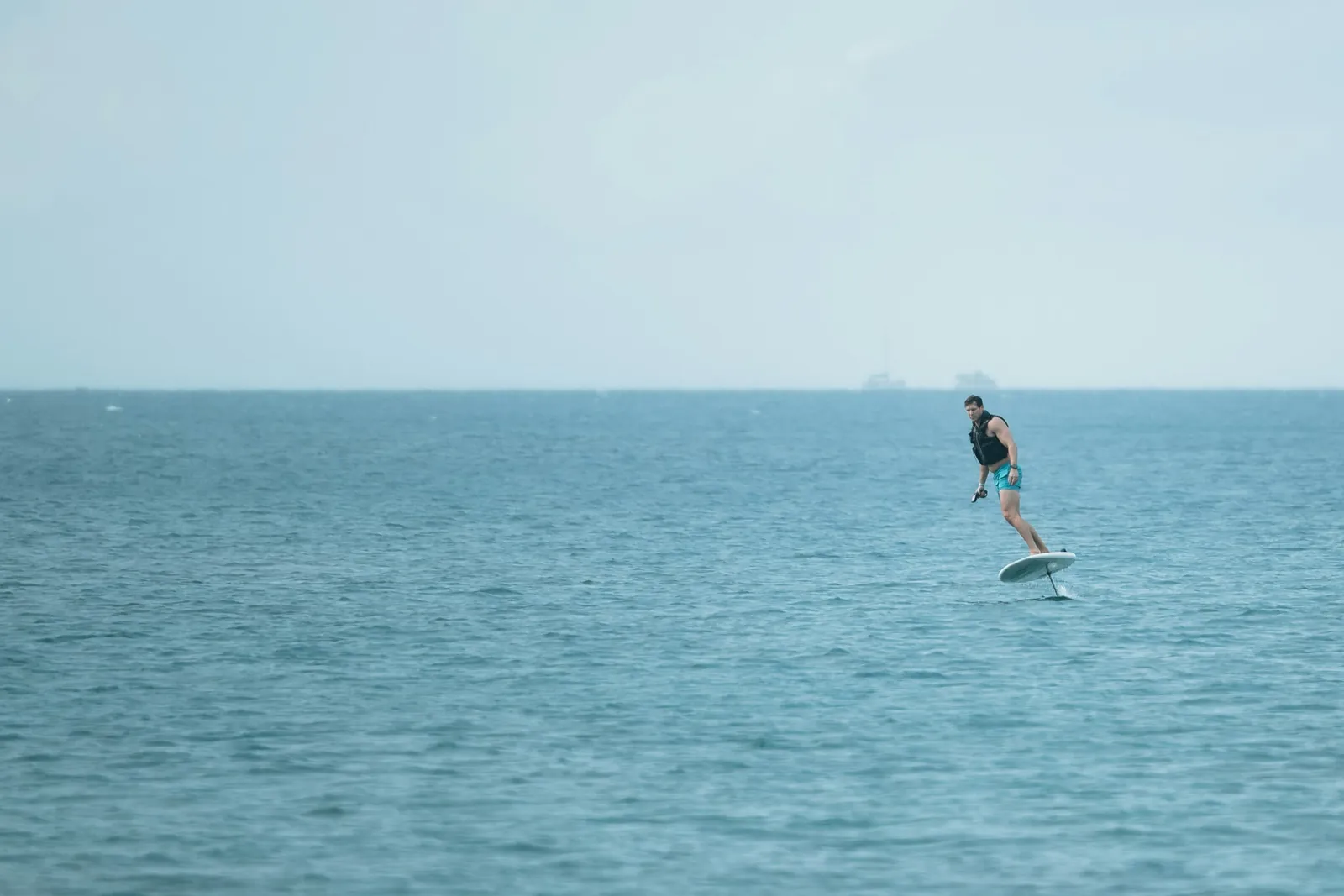E-foiler flying above open blue water